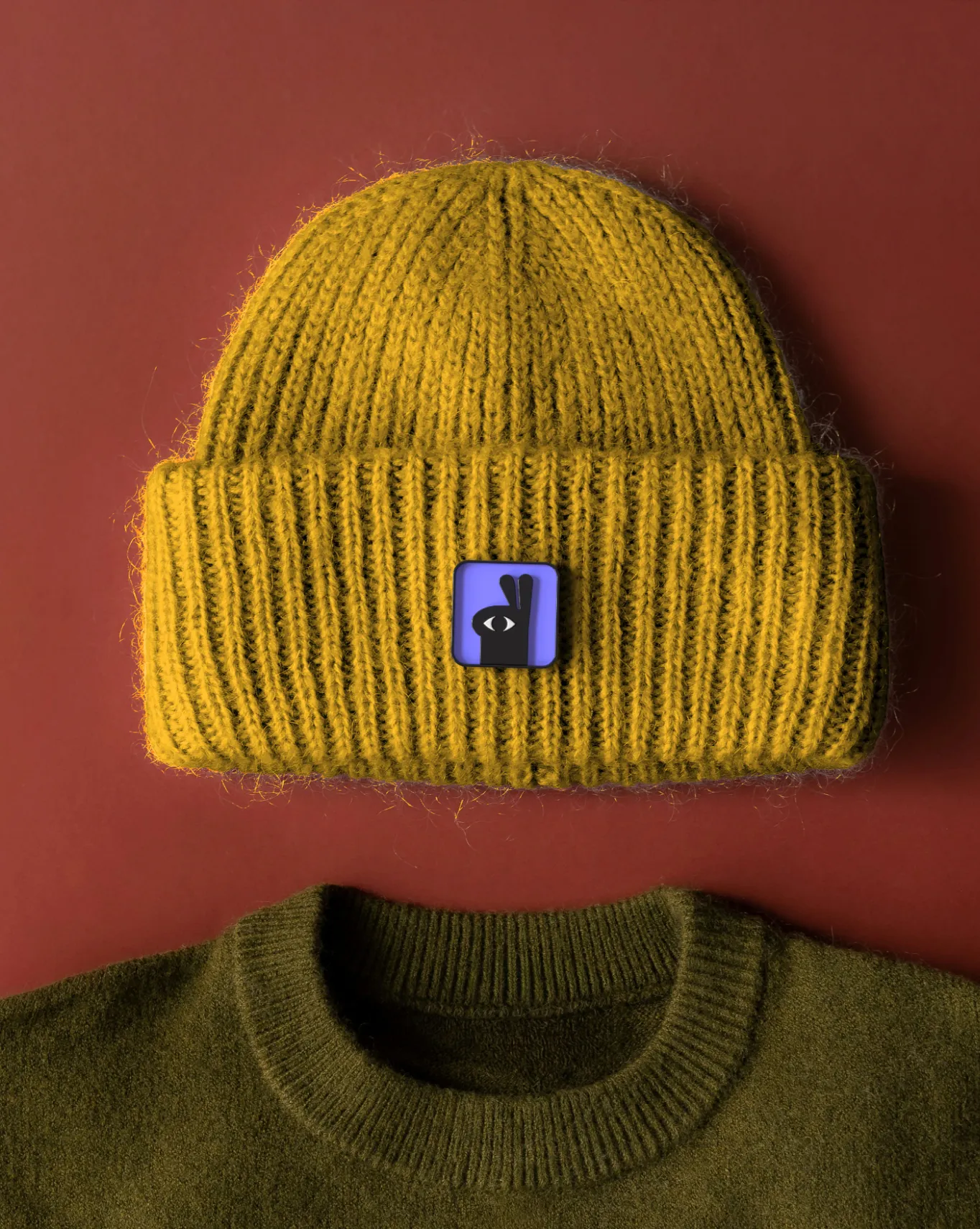 Estyl branded mustard beanie with rabbit pin 3D merch visual
